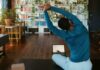 여성 건강관리, 균형 잡힌 생활 습관이 핵심 a man doing yoga in a living room